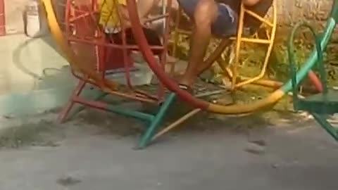 Playing on the swing with dad