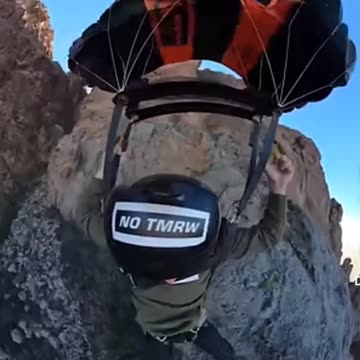 BASE JUMP FAIL. Helmet says no tomorrow, yea. Close