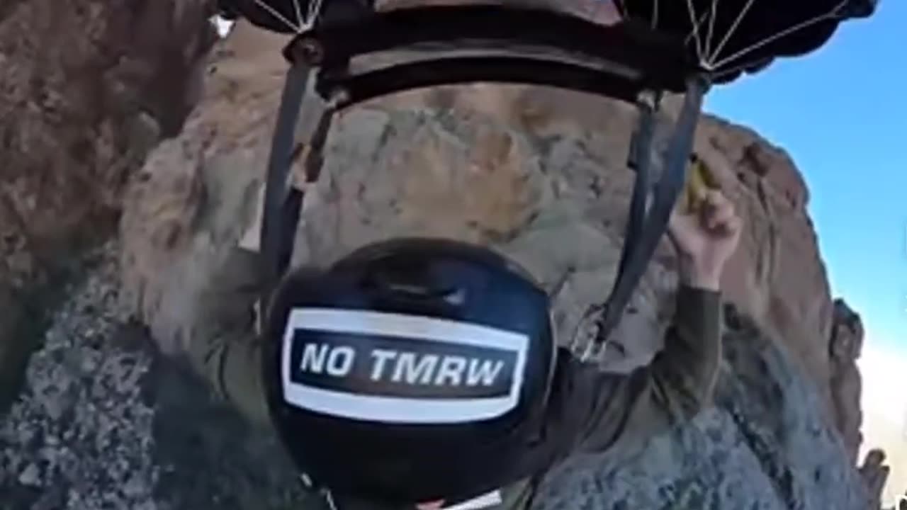 BASE JUMP FAIL. Helmet says no tomorrow, yea. Close