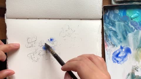 The first step: the complete demonstration process of a cluster of small blue flowers