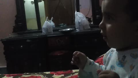 Kid trying to copy papa voice