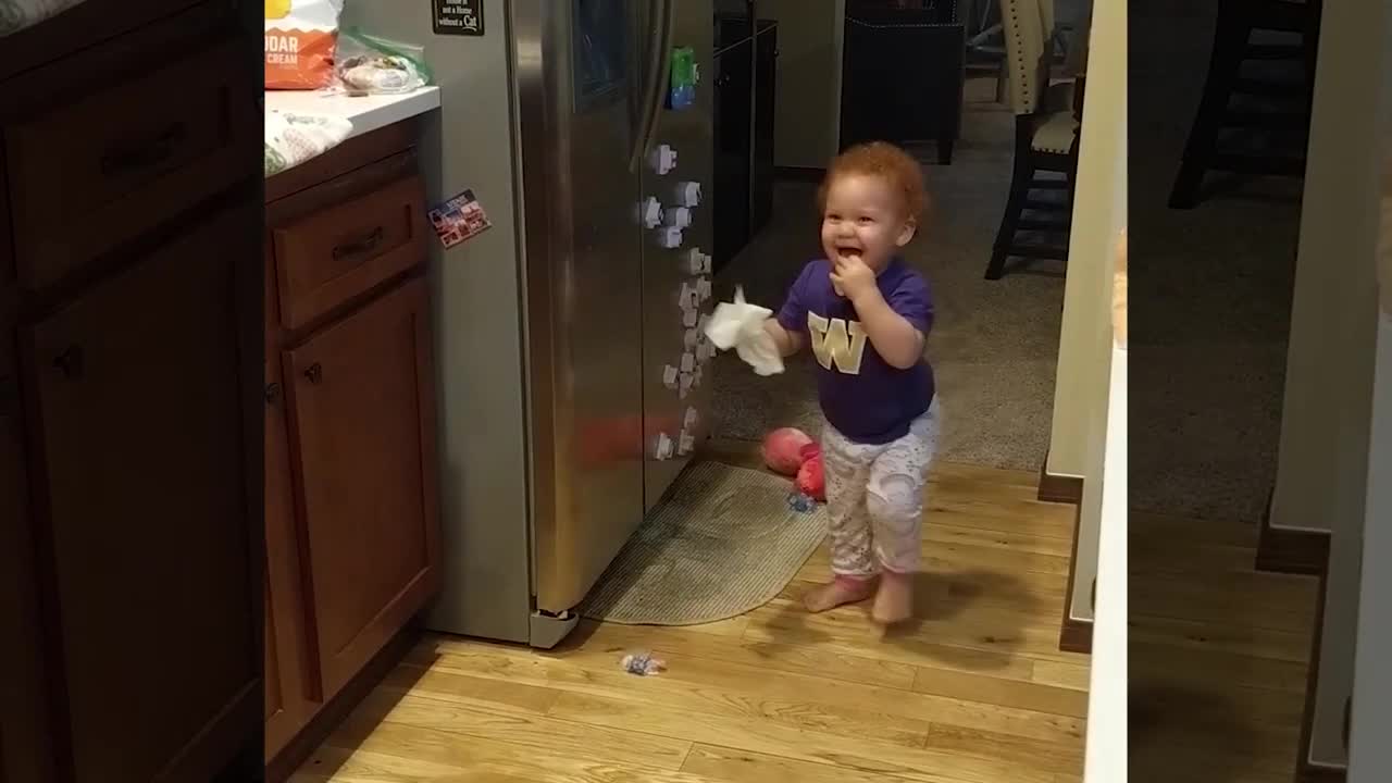 My troublemaker baby discovers the fridge