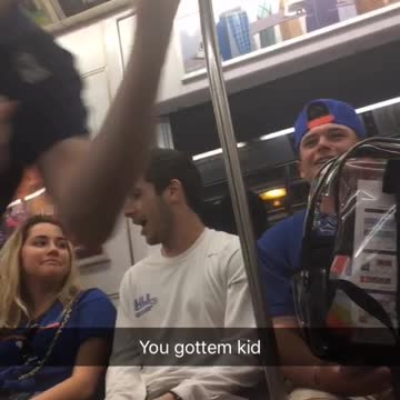 You gottem kid guy in black throws on subway train