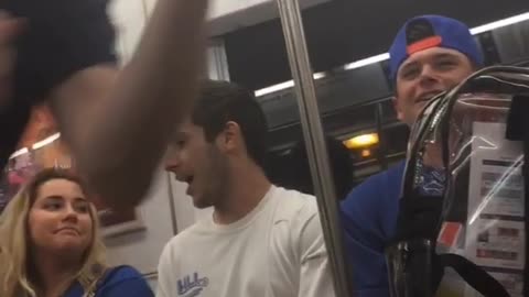 You gottem kid guy in black throws on subway train