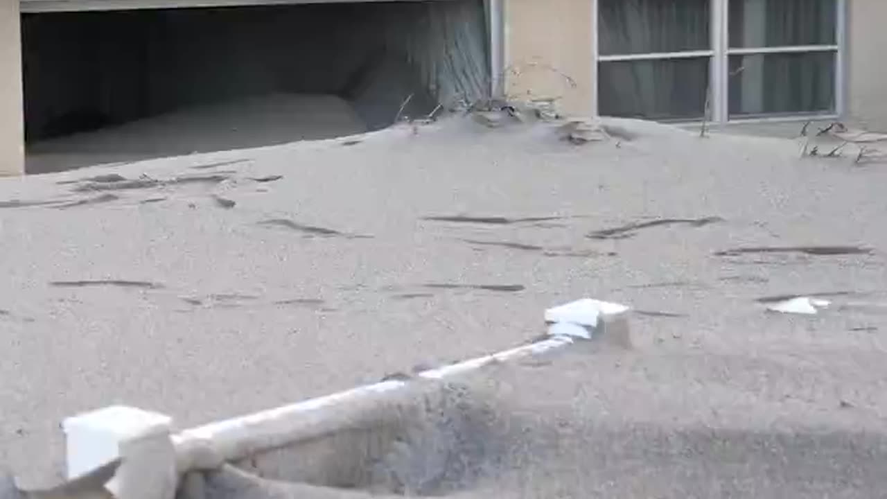 Homes along the coast in Venice, Florida, are buried in sand from Hurricane Milton.