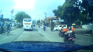 Oblivious Bicyclist Bumps Into Bus