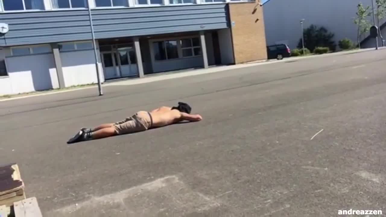 Shirtless boy skateboard fall yell