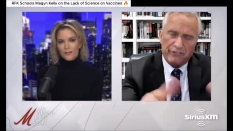 Robert Kennedy delivers a punch to a journalist