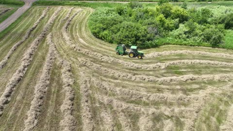 Big Tractors Hay Baling on the Farm