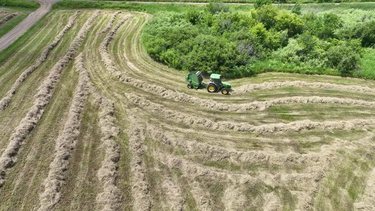 Big Tractors Hay Baling on the Farm