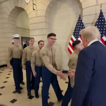 President Trump greets U.S. Marines who are currently stationed in France.