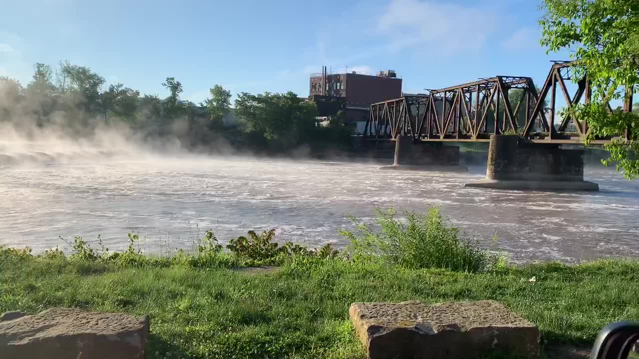 Roar of high water & mist over the dam