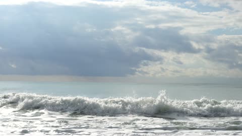 View of ocean waves scattered over the coast