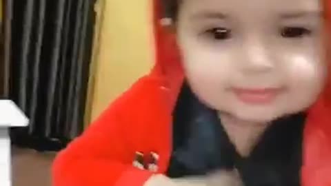 A cute baby say papa