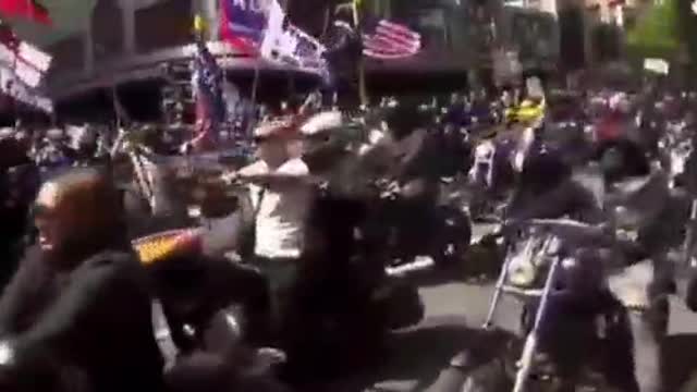 President Trump flags being waved at a biker rally against covid rules in New Zealand