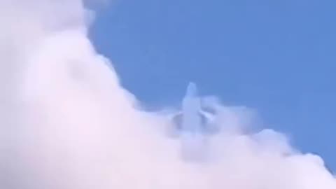 Figure Appearing In Clouds