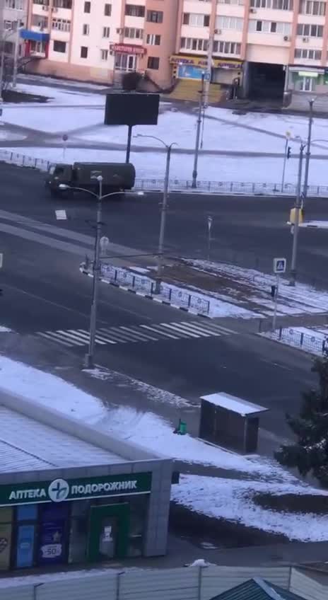 Russian light armored vehicles (tigr) and trucks driving straight into Kharkiv