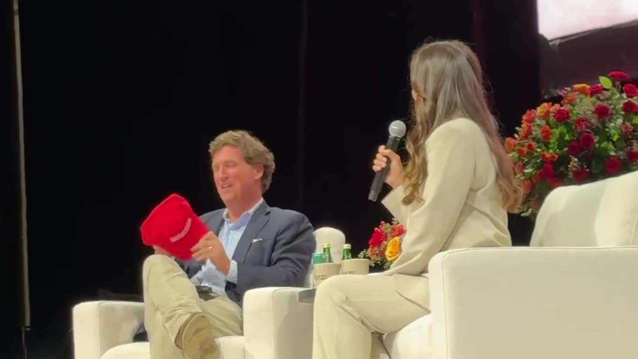 Nicole Shanahan just gifted Tucker Carlson a red "Make America Healthy Again" hat