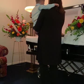 Son singing to Dead Father