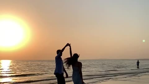 Couple dance at beach