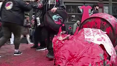 Demonstrators toppled statue and covered it in paint Vancouver’s Women’s Memorial March