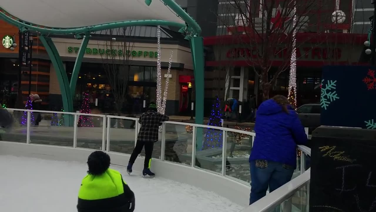 Heather & Brendan Ice Skating on Avenue at White Marsh