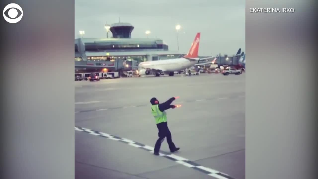 WEB EXTRA: Dancing Airport Employee