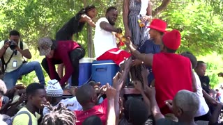 'They're all dead': Haitians mourn loved ones after massacre