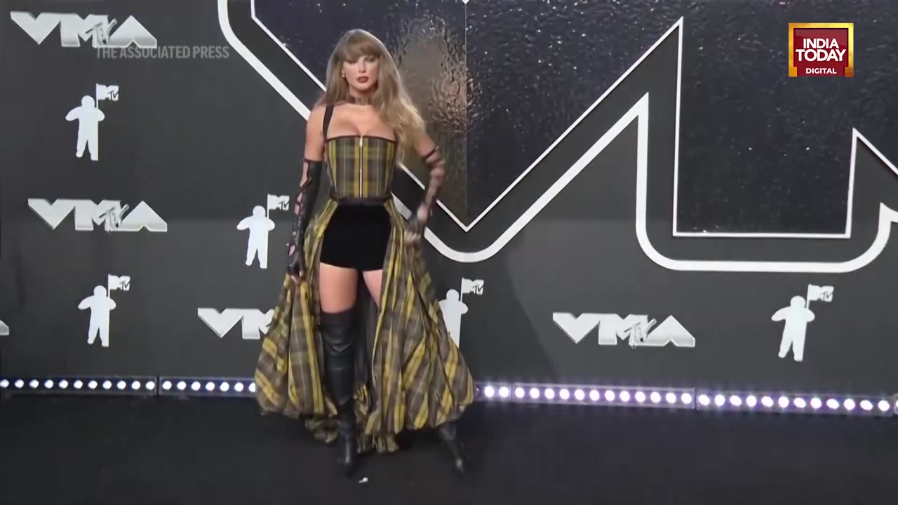 Trump-Taylor Swift_ Amid Declared Support For Harris, Taylor Poses At MTV Awards