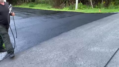 Professional Asphalt Spray Sealing: “The Smooth One” Top Coats Pavement Maintenance