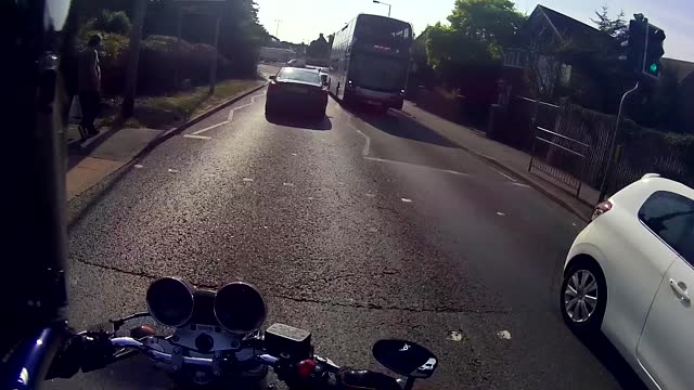 Cyclist Hits Pedestrian at Red Light