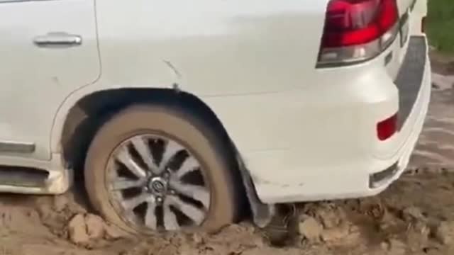 Toyota land cruiser in a mud