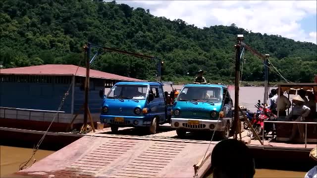 A ferry crossing the Mekong River, in Lao, imagine doing this every day