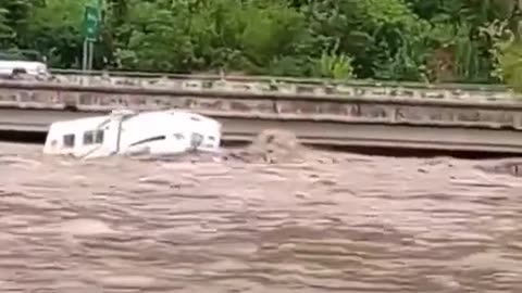 Camper floating down Tennessee river