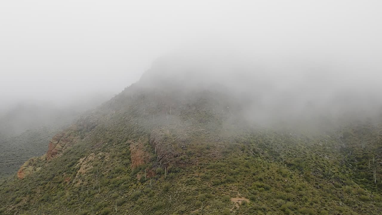 'Low Cloud Flows Over the Saddle' - Mountain Desert Landscape