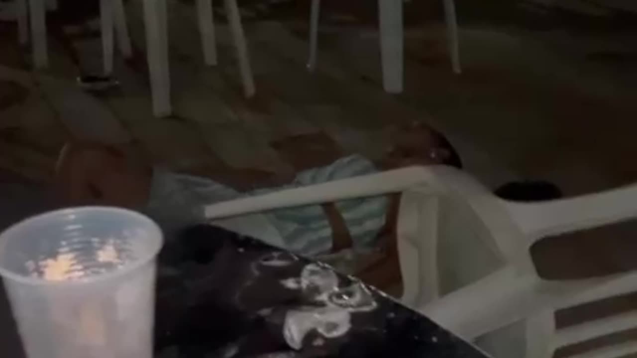 Woman Somersaults Over Plastic Chair