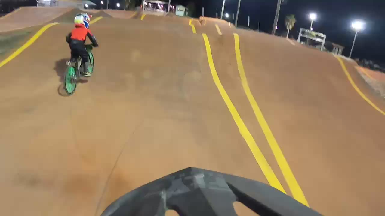 Go pro view on helmet of BMX race 5 year old GIRL getting into first place!