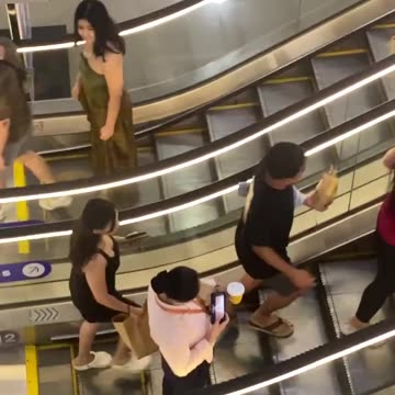 Distracted Person Doesn't Realise Escalator Has Stopped 🤣