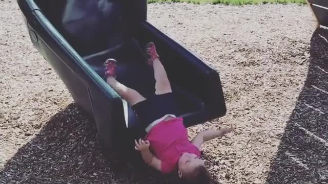 Collab copyright protection - pink shirt girl slide upside down
