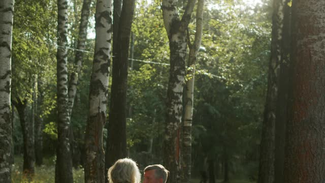 A HAPPY COUPLE IN THE MIDDLE OF A VALLEY