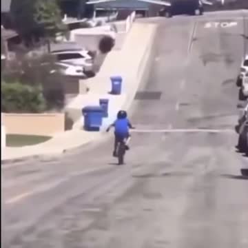 Kid running into trash