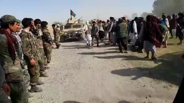 Taliban in Humvees, Citizens Surrender.