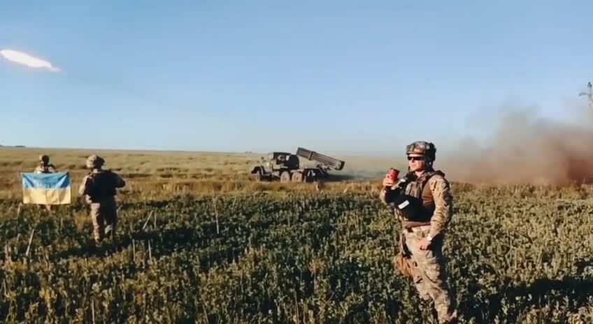 Ukrainian troop shooting video with coffee