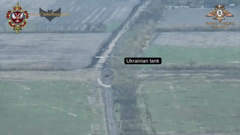 Ukrainian tank drives down middle of road