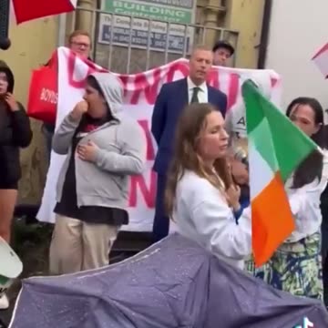 Ukrainian woman interrupts an Irish protest and has to be protected after making death threats