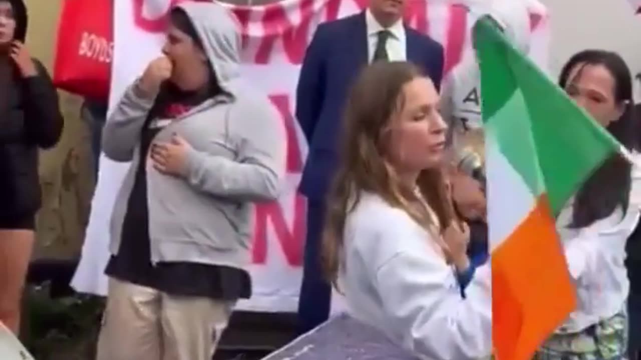 Ukrainian woman interrupts an Irish protest and has to be protected after making death threats