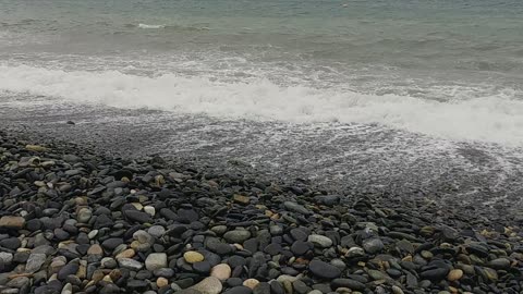 waves on stone sand