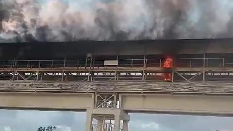 Fire erupts at an Israeli factory following Yemeni missile strike on Tel Aviv