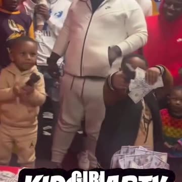 Sad! Black Boys Mimic Rappers with Guns and Money at a Birthday Party