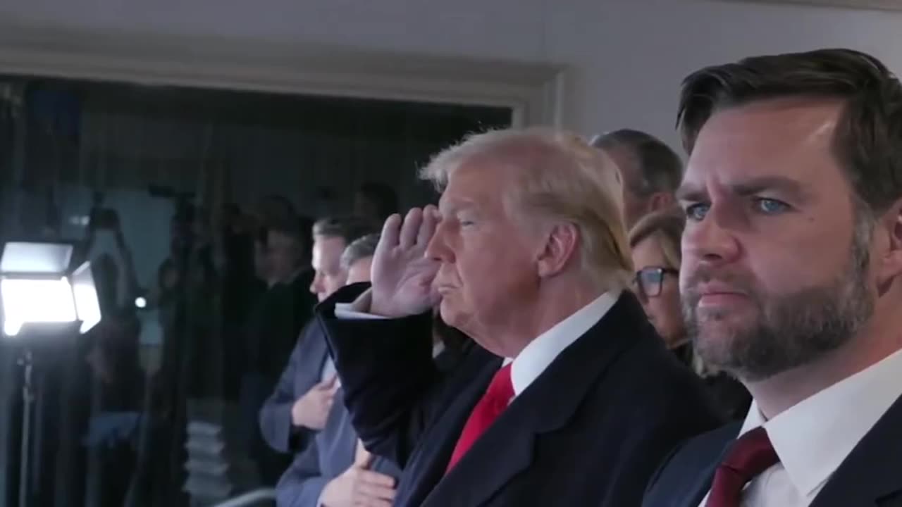 President Donald J. Trump salutes as the National Anthem is performed at the Army Navy Game